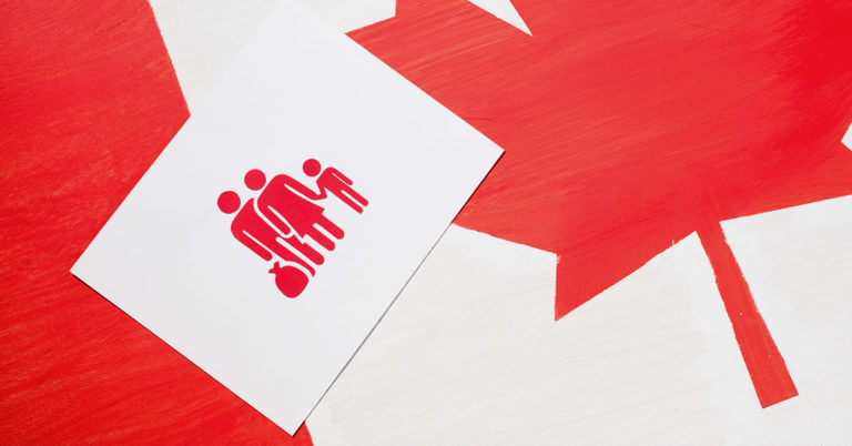 canadian flag with sign family holding money